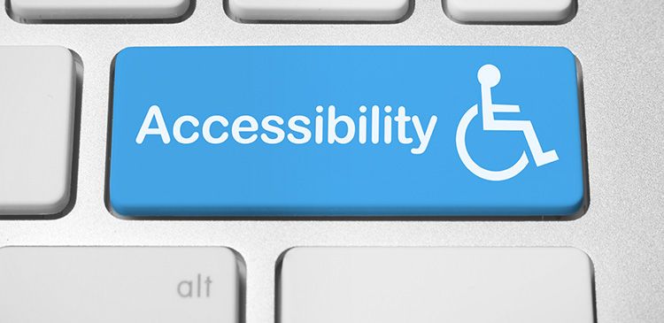 ada compliant bank website design image of accessibility key on keyboard to visually represent website accessibility