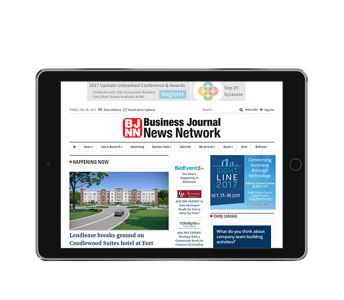 news website design tablet landscape view of cny business journal from acs web design and seo