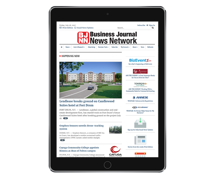 news website design tablet portrait of cny business journal from acs web design and seo