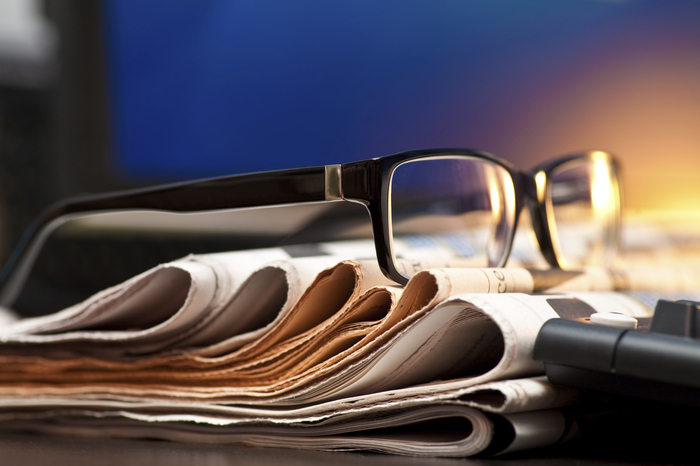 law office web design with legal seo copywriting image of glasses on top of a stack of papers