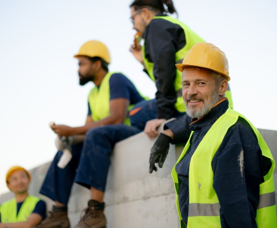 construction website design happy construction crew