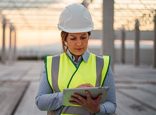consulting website design for multiple user journeys construction worker on tablet