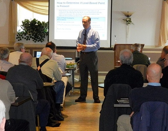 consulting website design showcasing industry expertise man giving presentation