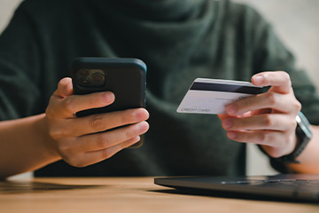 digital marketing company near syracuse ny from acs web design and seo customer holding phone and credit card