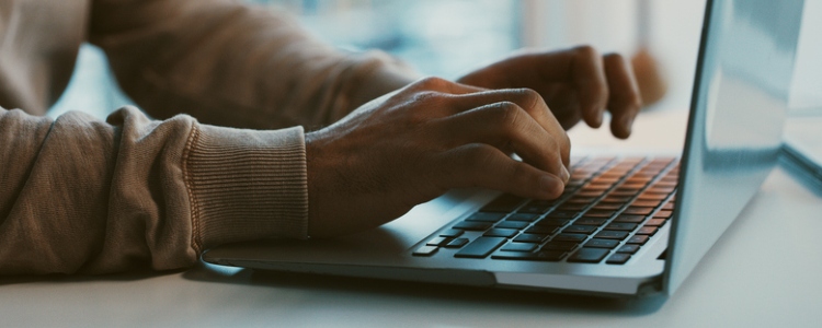 generative engine optimization geo vs seo person typing on laptop